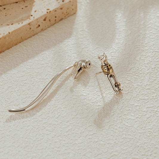 Egyptian cat single dangle earring in two-tone sterling silver with gold-tone brass accents, showing 925 hallmark on back.