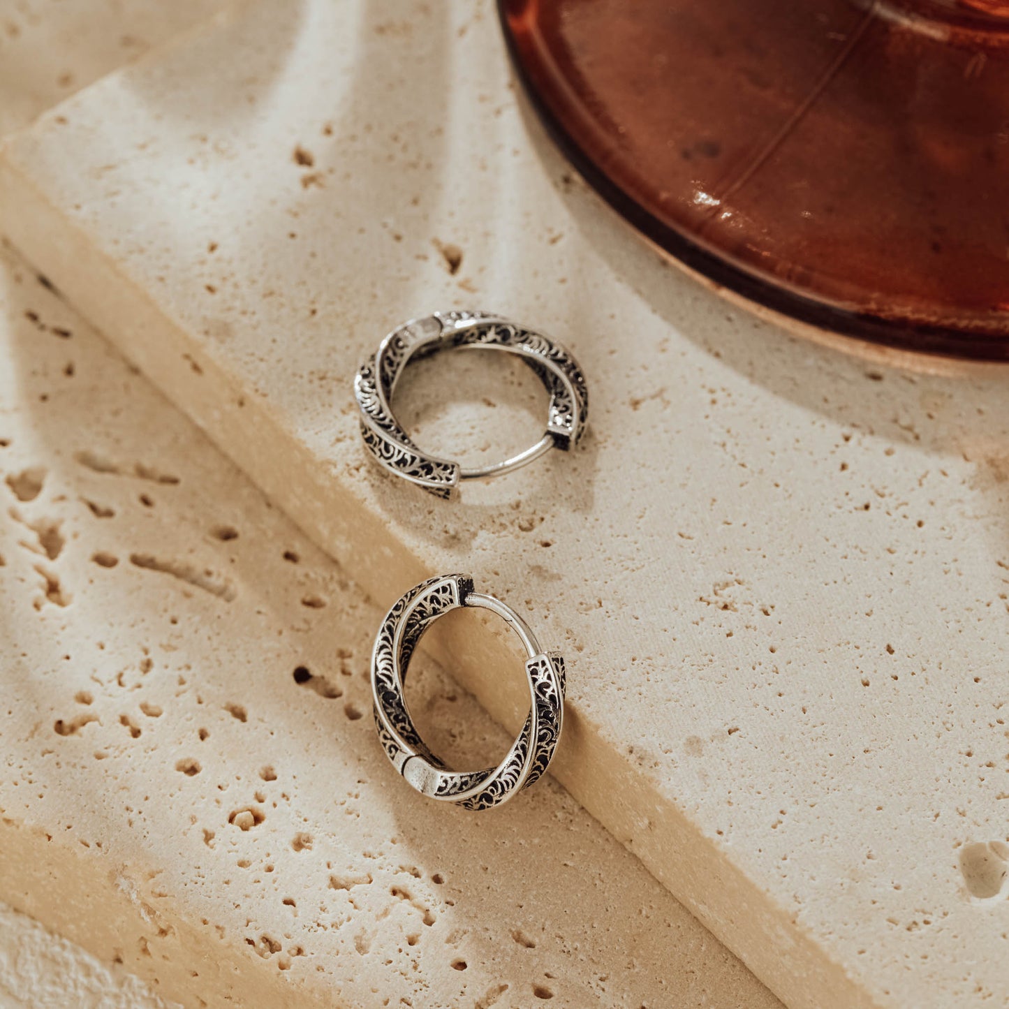 925 sterling silver engraved huggie earrings, oxidized details close-up