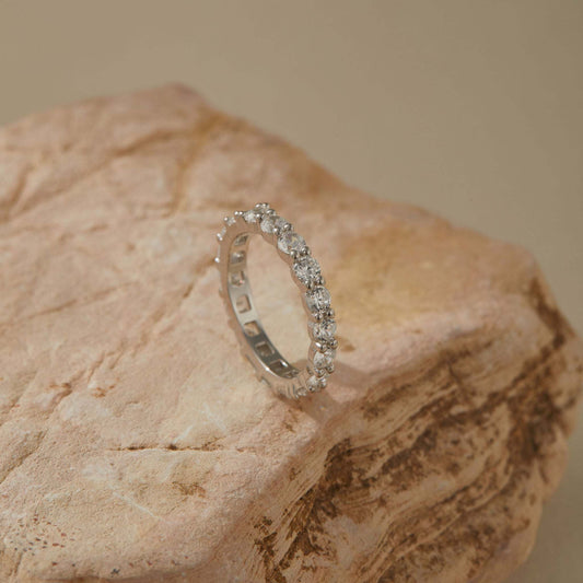 Round-cut CZ side of reversible silver eternity band