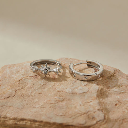 Side view showing cubic zirconia starburst and engraved star hoop in silver