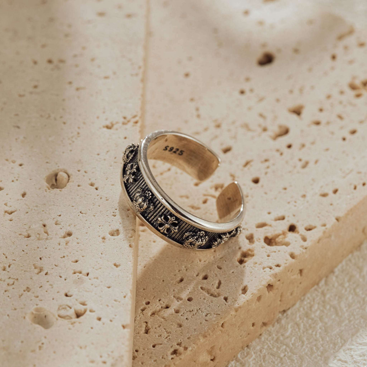 Sterling silver adjustable ring with oxidized engraving detail, 925 hallmark visible on open band