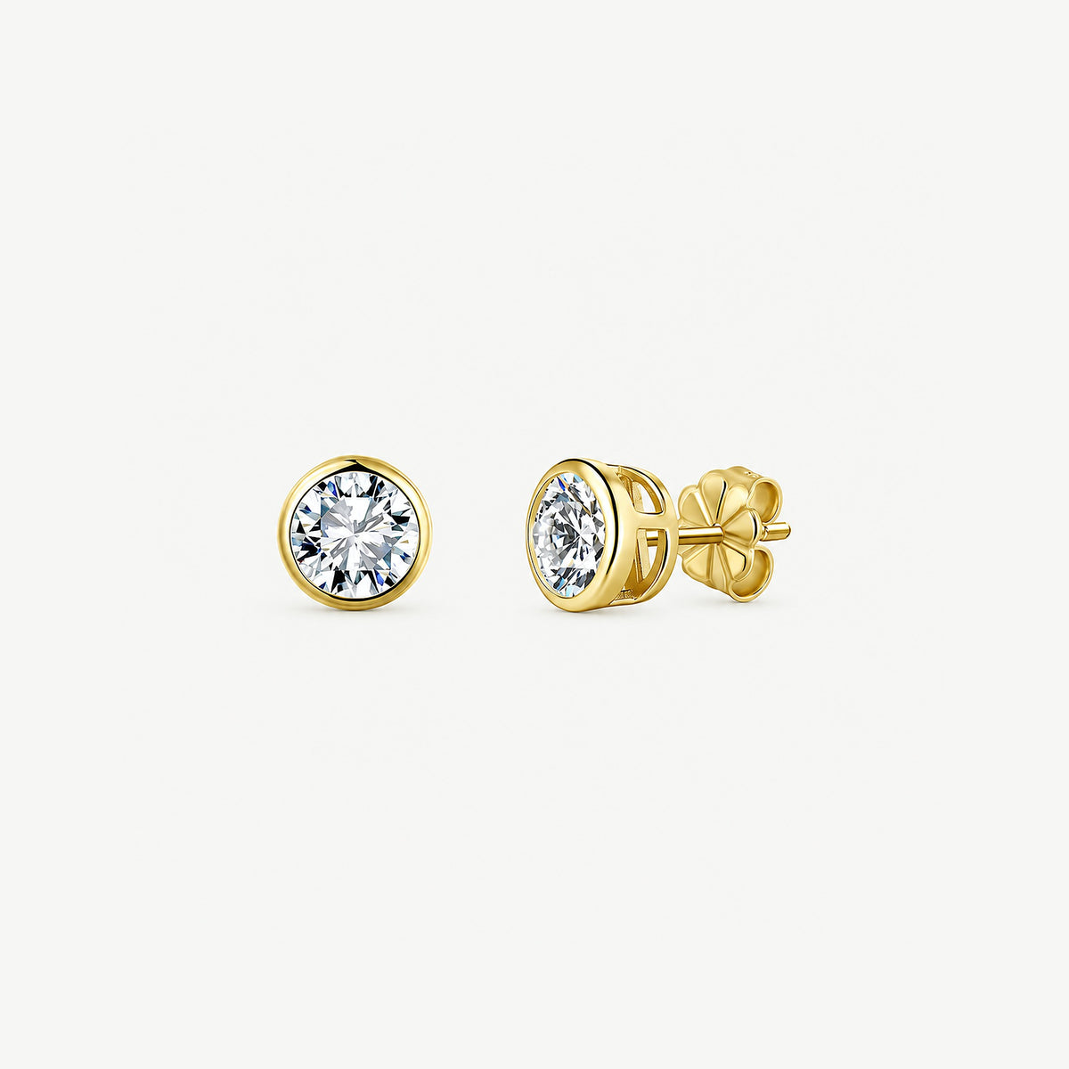 1 ct moissanite bezel stud earring shown face-on beside a side view with the gold butterfly back attached