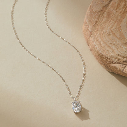White gold plated halo CZ sterling silver necklace, close-up view
