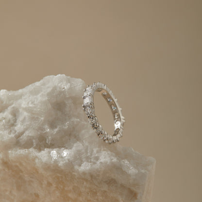 Reversible S925 eternity ring showing both cuts on neutral background