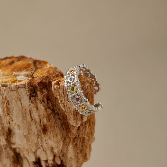 Floral sterling silver ring with multicolor crystals, adjustable open band