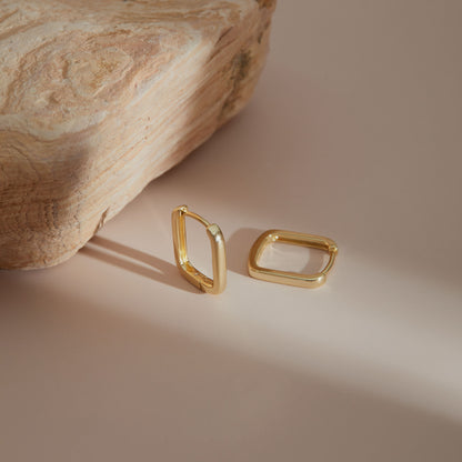 Close-up of S925 rectangular huggie earring clasp detail