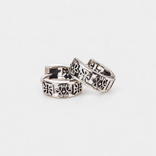 Oxidized sterling silver gothic huggie earrings with heraldic cross and fleur-de-lis engraving
