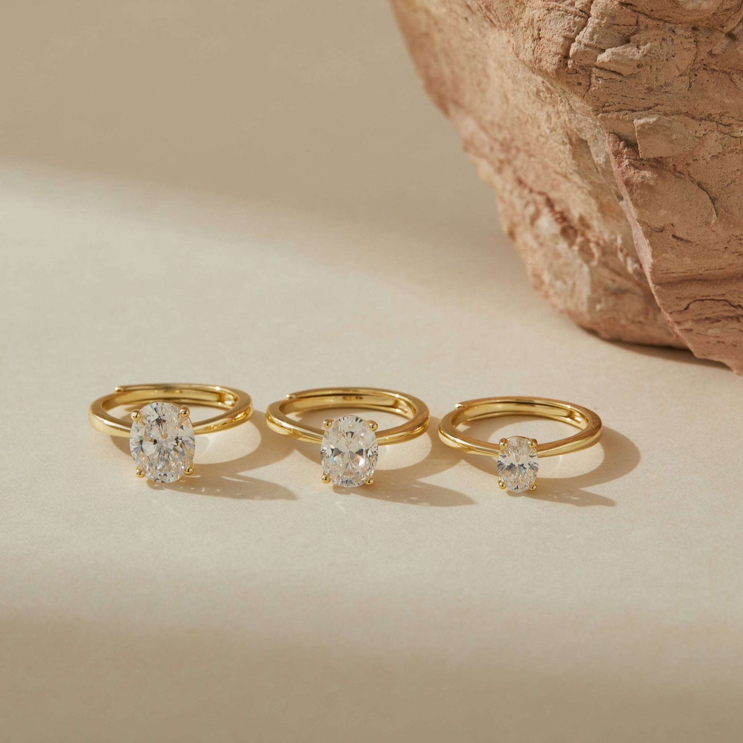 Three adjustable gold plated sterling silver solitaire rings showing 1ct 2ct and 3ct sizes