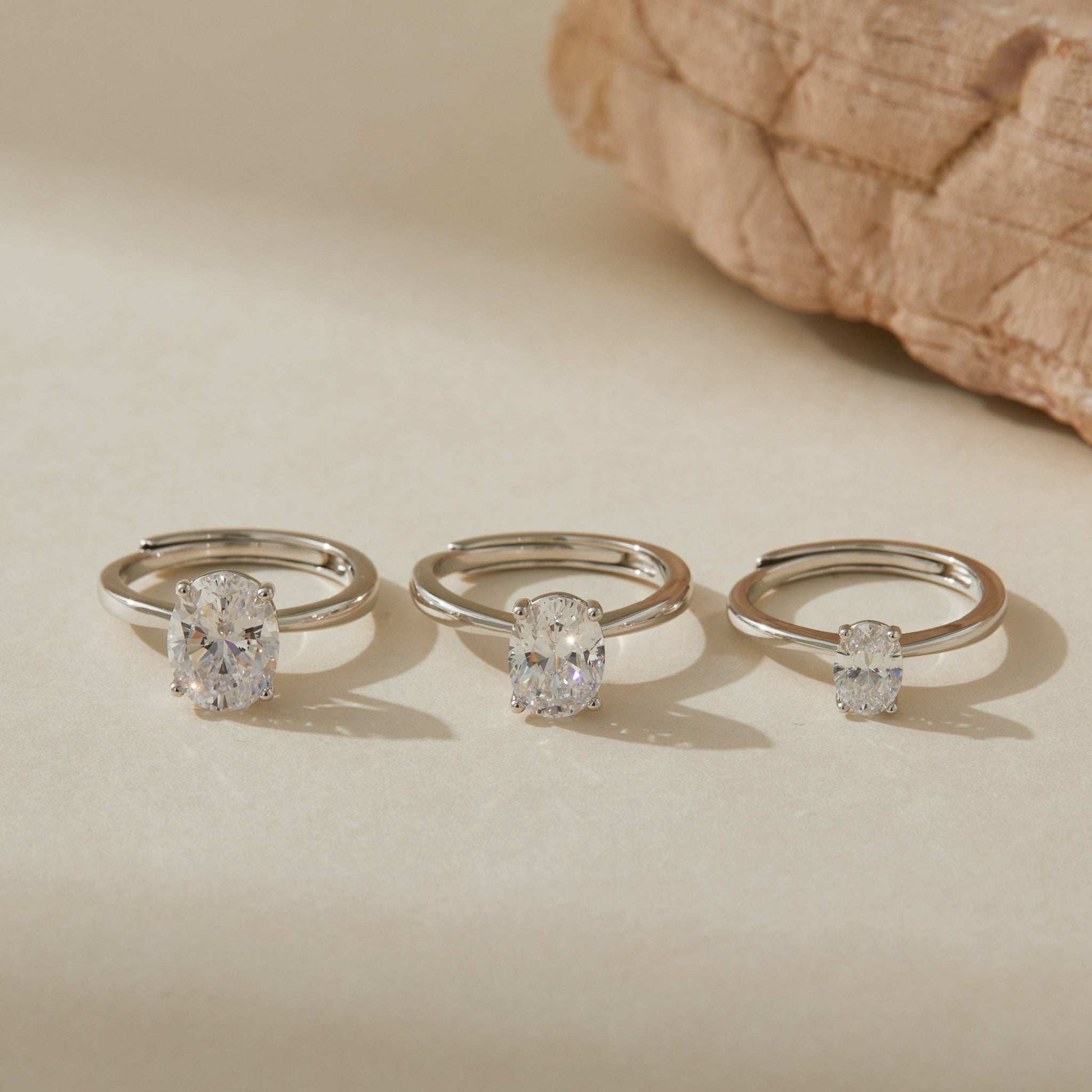 Three adjustable white gold plated S925 sterling silver rings with different stone sizes
