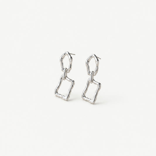 Pair of sterling silver chain link dangle earrings standing upright, molten oval top link above a wavy rectangular frame