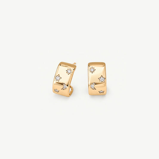 Pair of gold-plated sterling silver chunky half hoop earrings set with stars and a crescent moon, front view