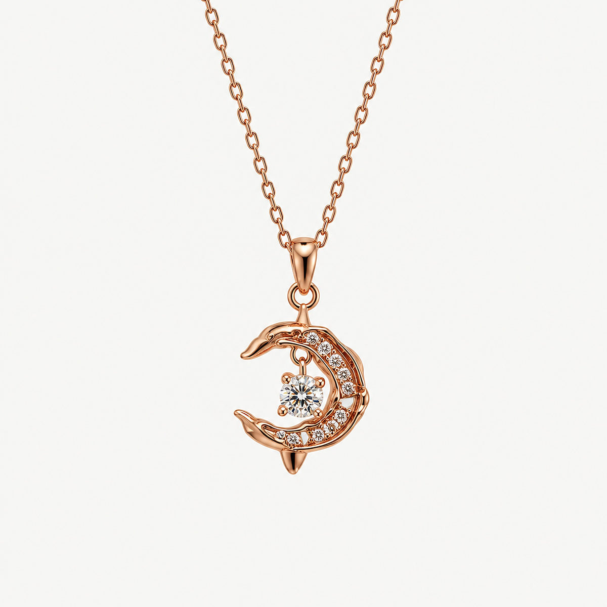 18k gold-plated crescent moon dolphin pendant hanging from its cable chain, a round stone swinging at the center