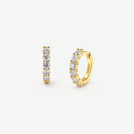 14k gold plated moissanite huggie hoops on off-white, one face-on with prong-set stones, one angled to show the hinge
