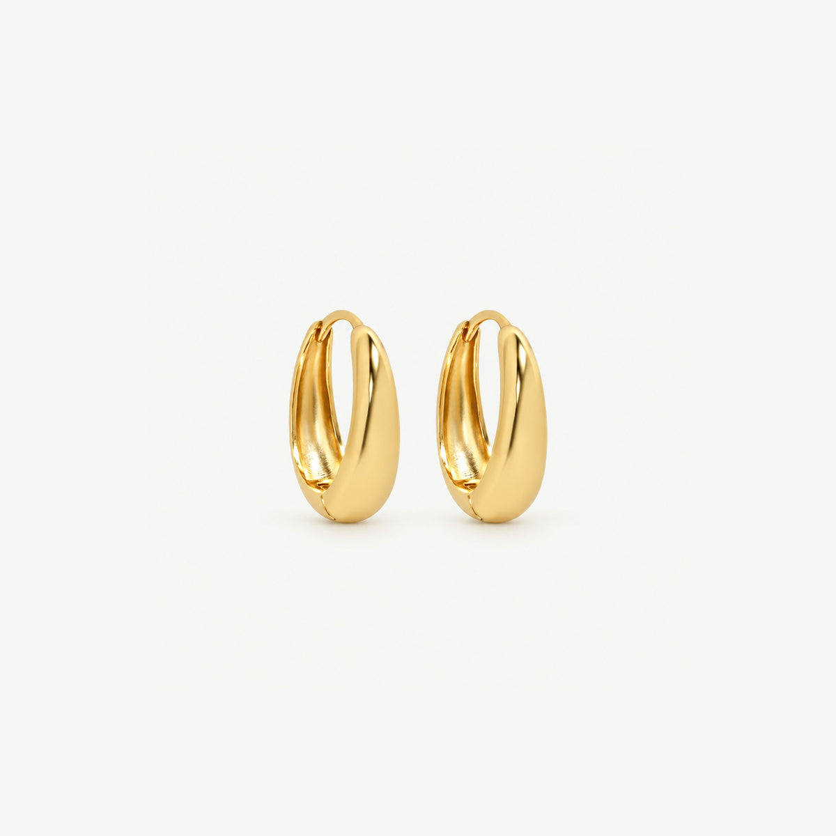 Pair of 12 mm gold-plated teardrop huggie hoops, the largest size, upright to show the hinge and the inner band