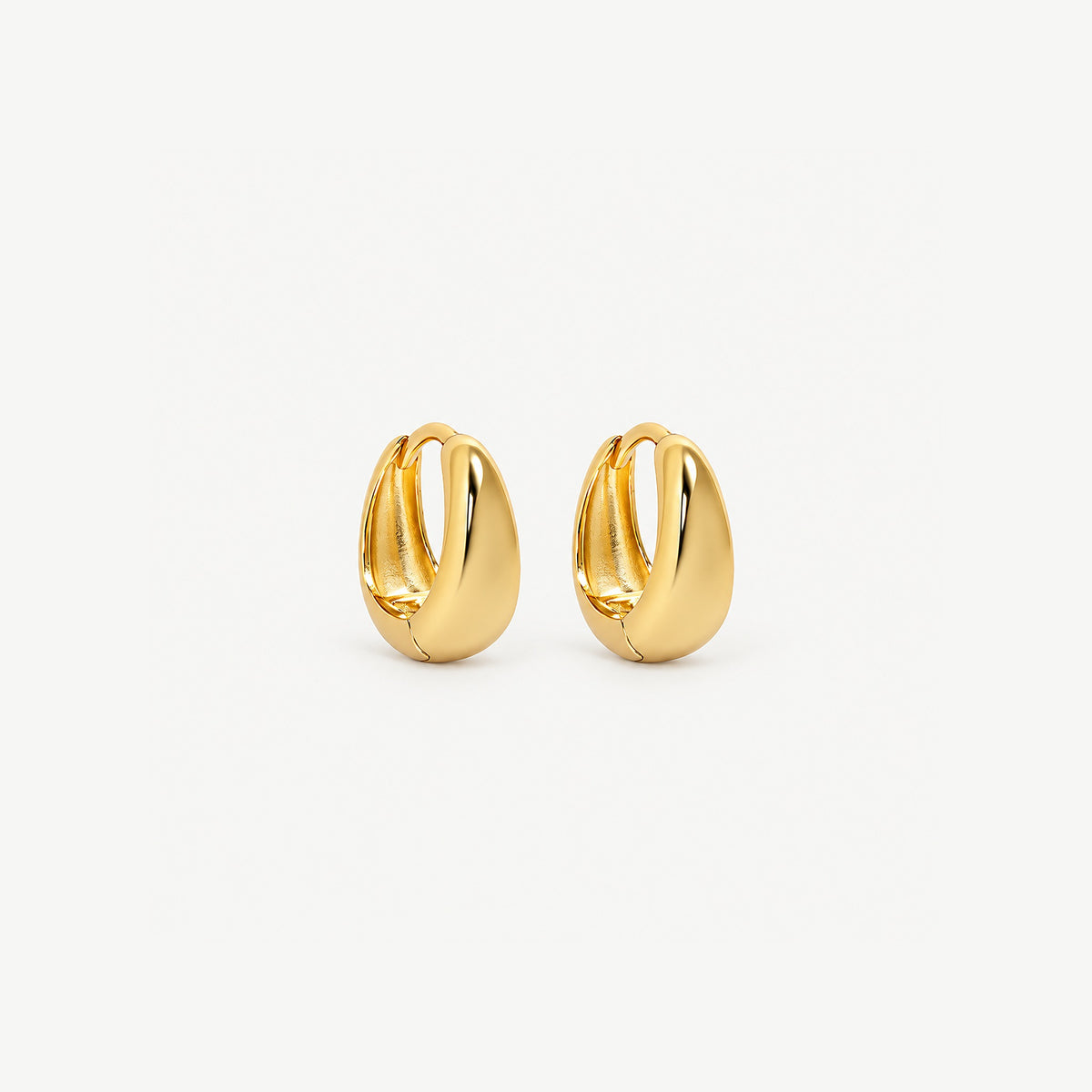 Pair of 8 mm gold-plated teardrop huggie hoops standing upright, the smallest size with a short rounded drop