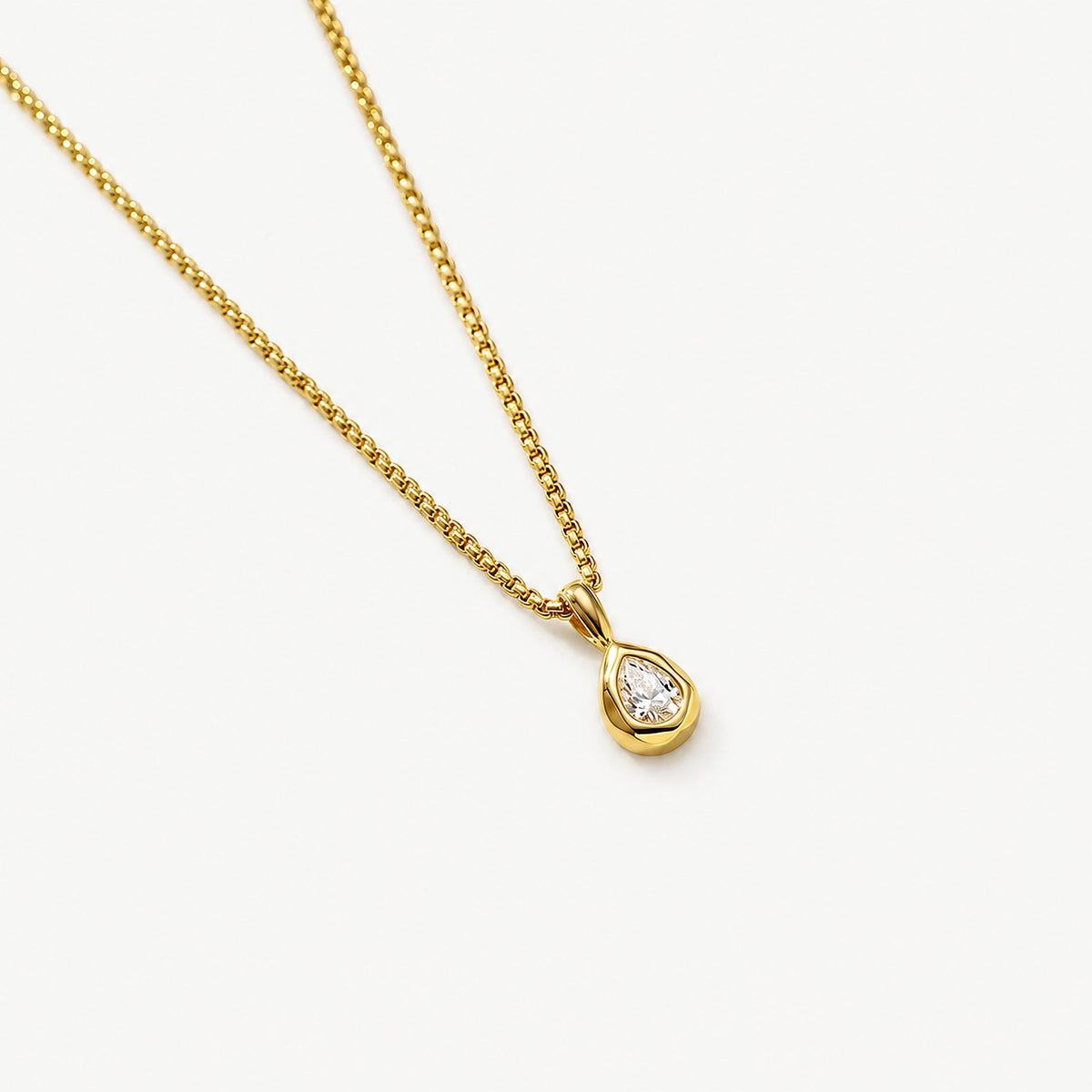 14k gold plated stainless steel teardrop pendant necklace on a box chain, pear-cut clear stone in a smooth bezel