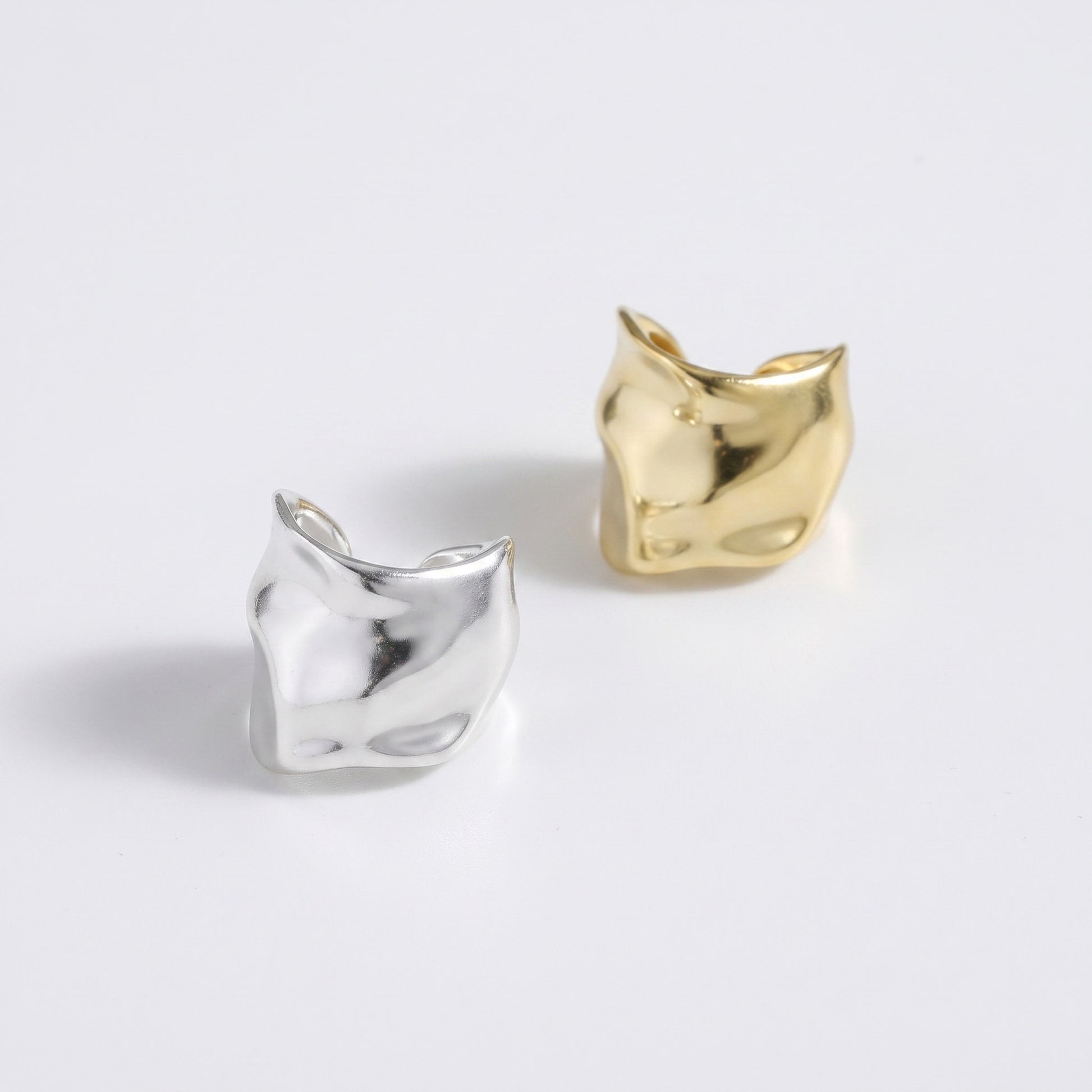 Large hammered ear cuff in gold plated and sterling silver, both colourways of the wider band