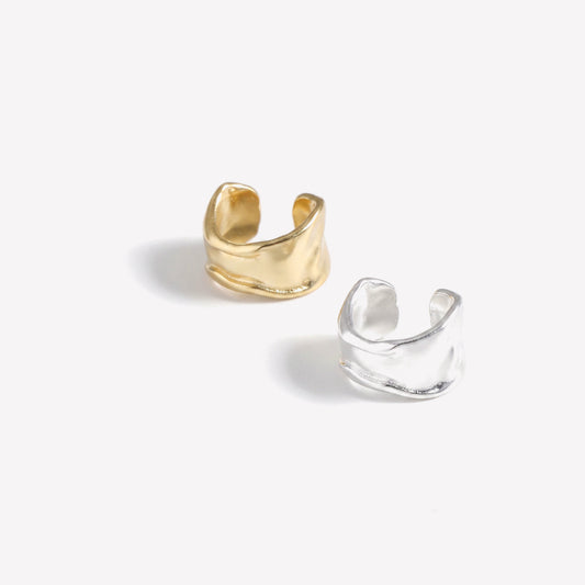 Small hammered ear cuff shown in gold plated and sterling silver, the two colourways together