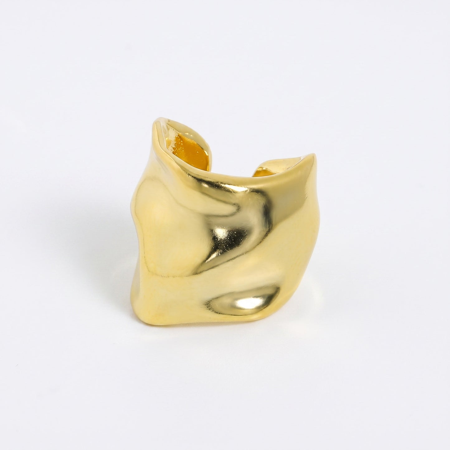 Gold plated sterling silver ear cuff in the large width, wide hammered band in a soft matte finish