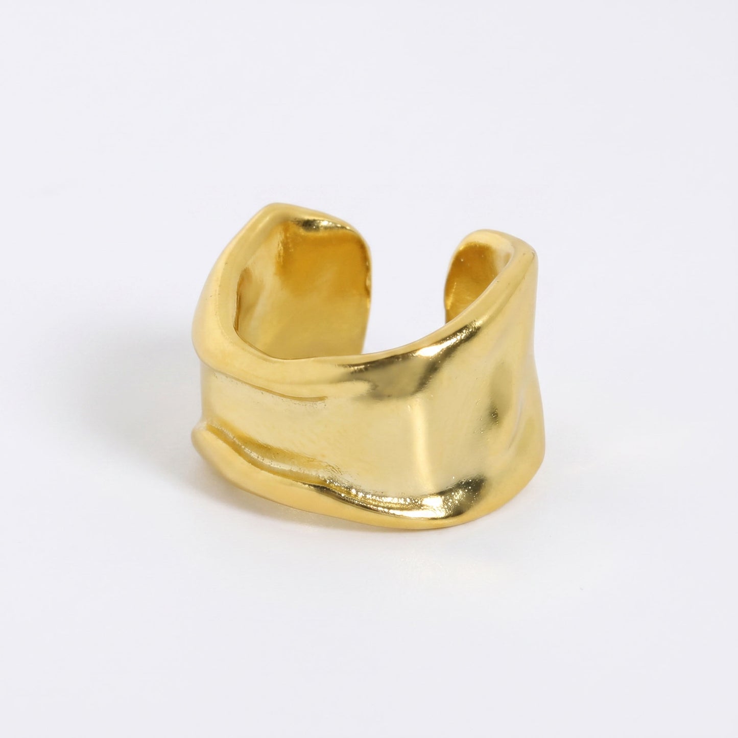 Gold plated sterling silver ear cuff, small width, folded organic band seen from the open side