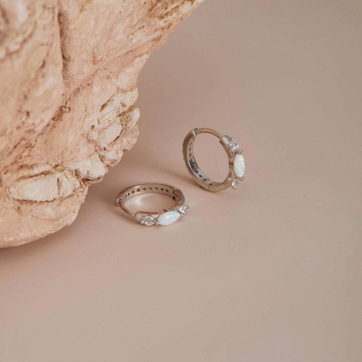 White gold opal huggie hoops with cubic zirconia accents
