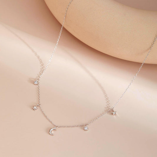 Silver flat lay — Adjustable Celestial Sparkle Necklace, dainty sterling silver.