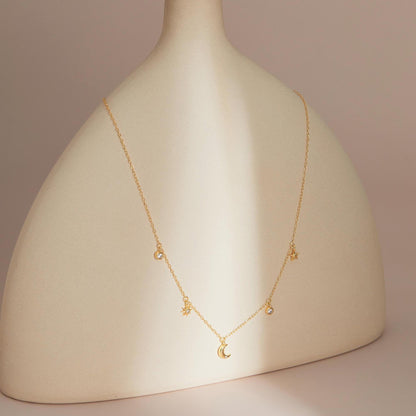 Gold on stand — Celestial Sparkle Necklace presentation shot.