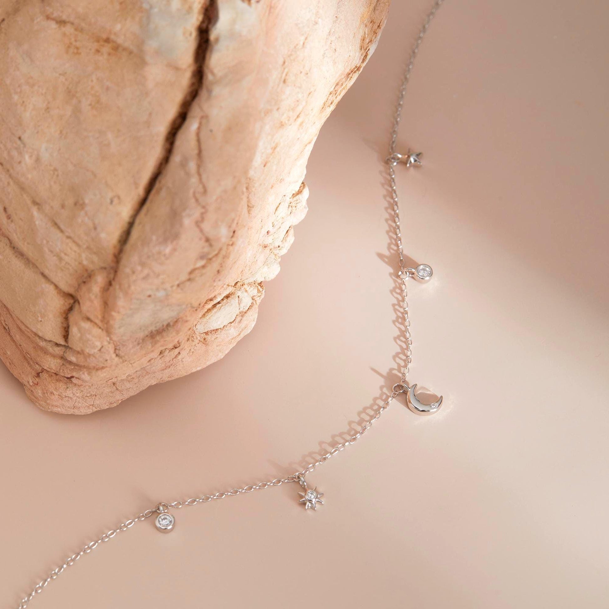Silver with stone prop — Moon & star charms, sterling silver with CZ.