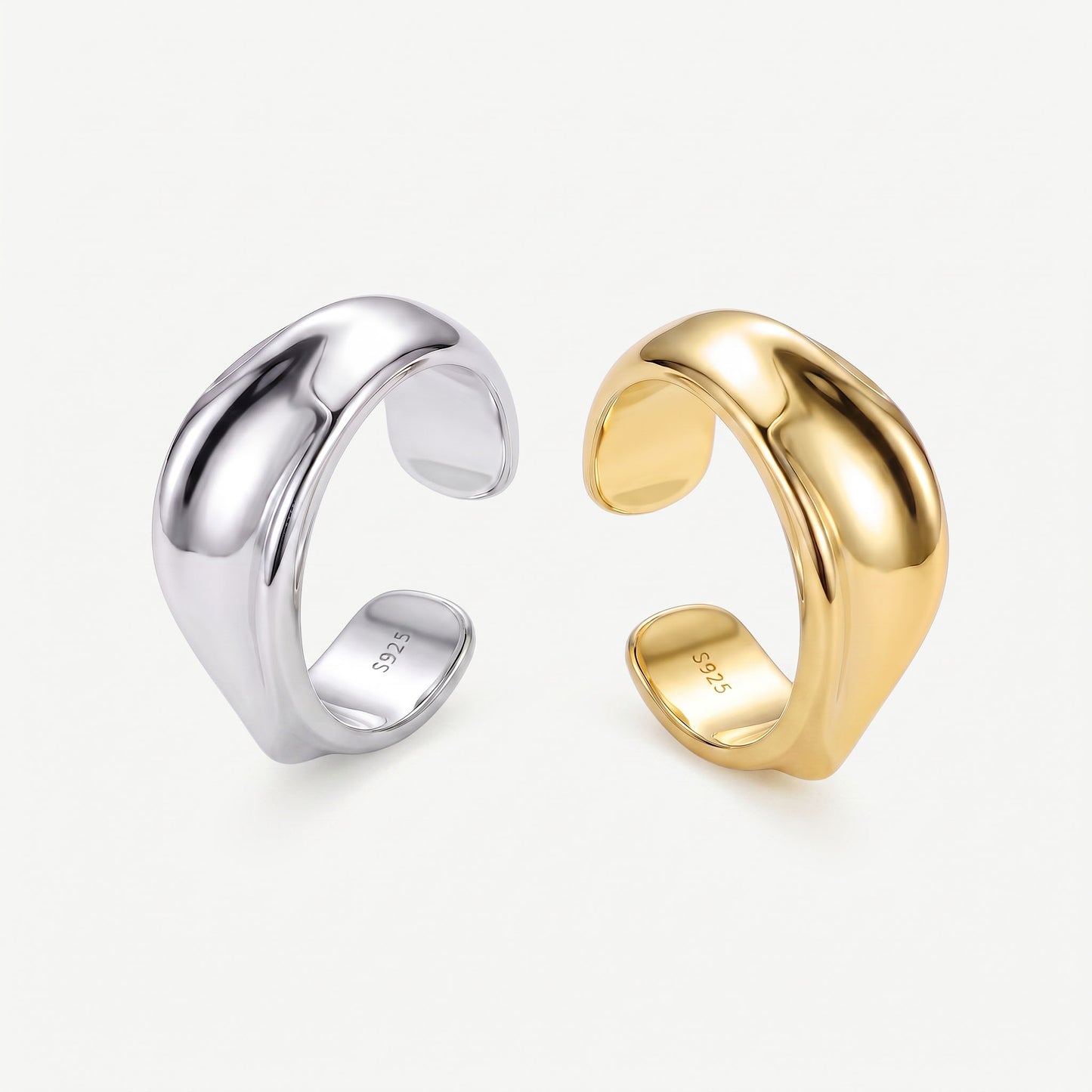 Interior of the gold and silver twisted ear cuffs with the S925 sterling silver hallmark visible