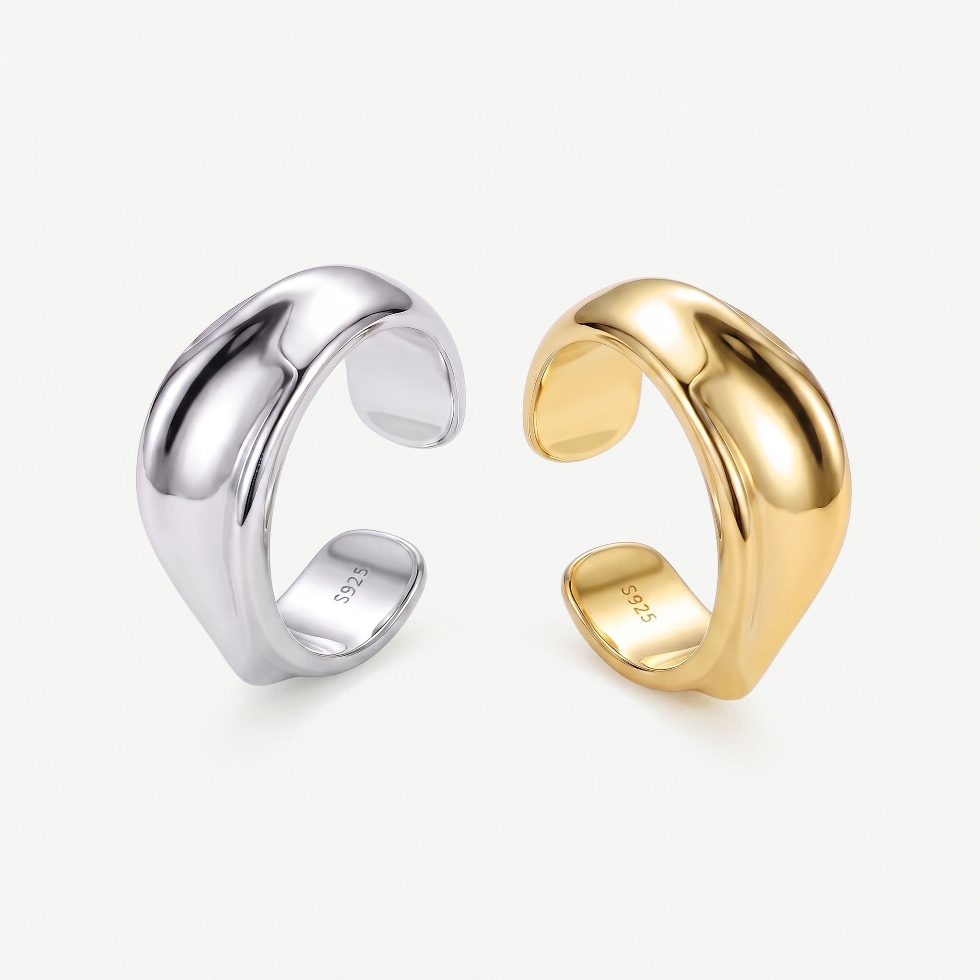 Interior of the gold and silver twisted ear cuffs with the S925 sterling silver hallmark visible