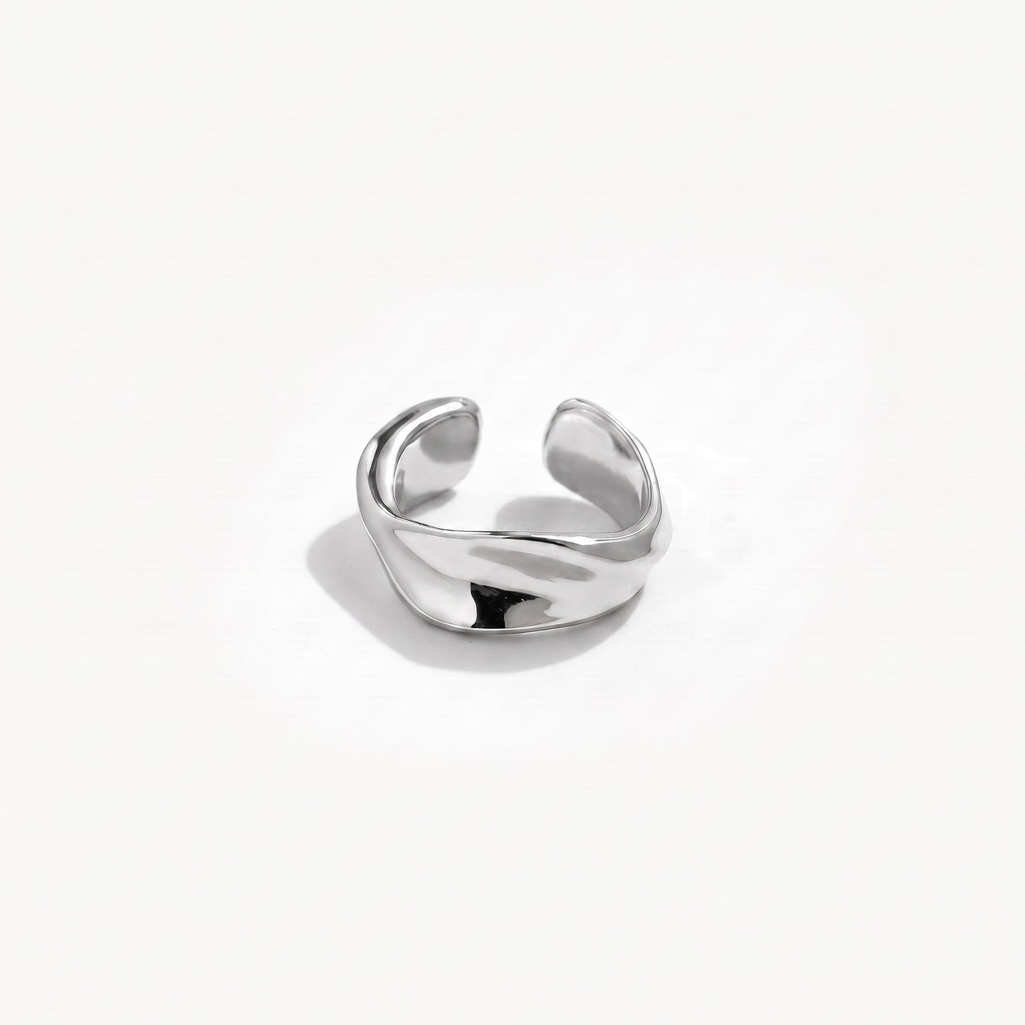 Sterling silver twisted ear cuff shown alone from the front with the open band facing the camera
