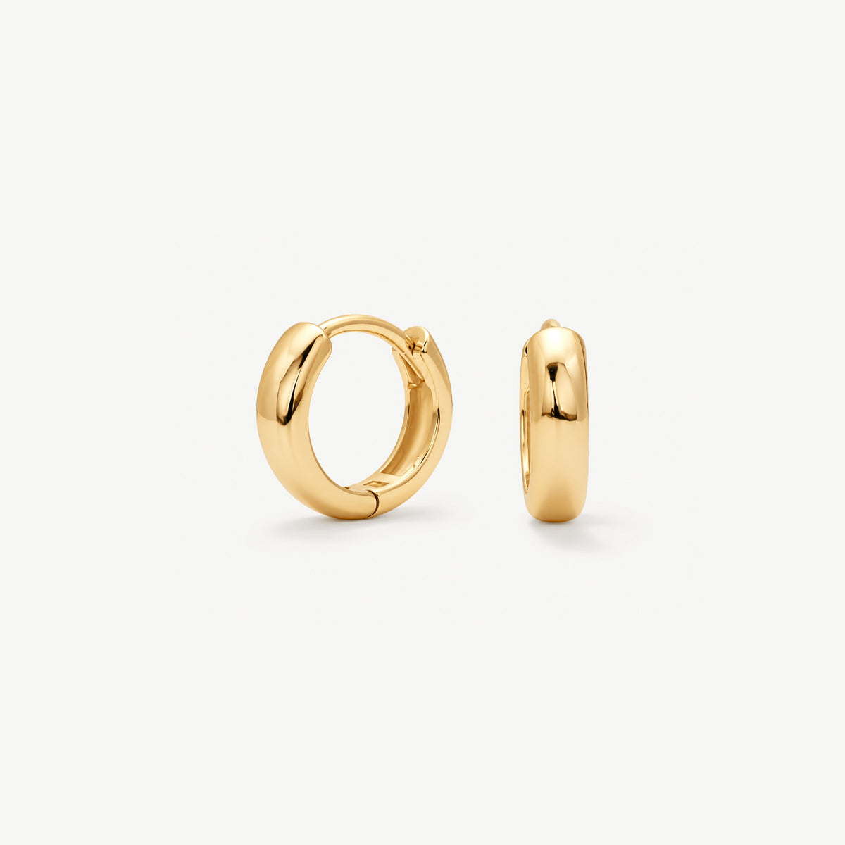 Pair of 9 mm gold plated huggie hoops, the largest size, one open circle facing front and one turned to the side