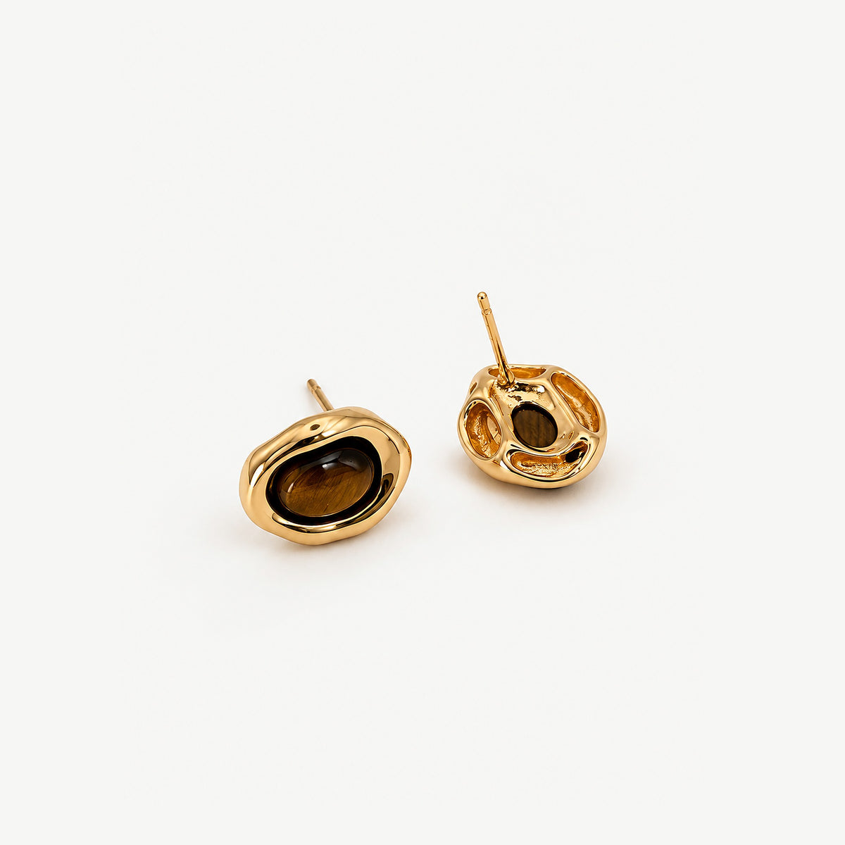 Gold tiger eye stud earrings, one face up and one turned over to show the open cutout back and the post